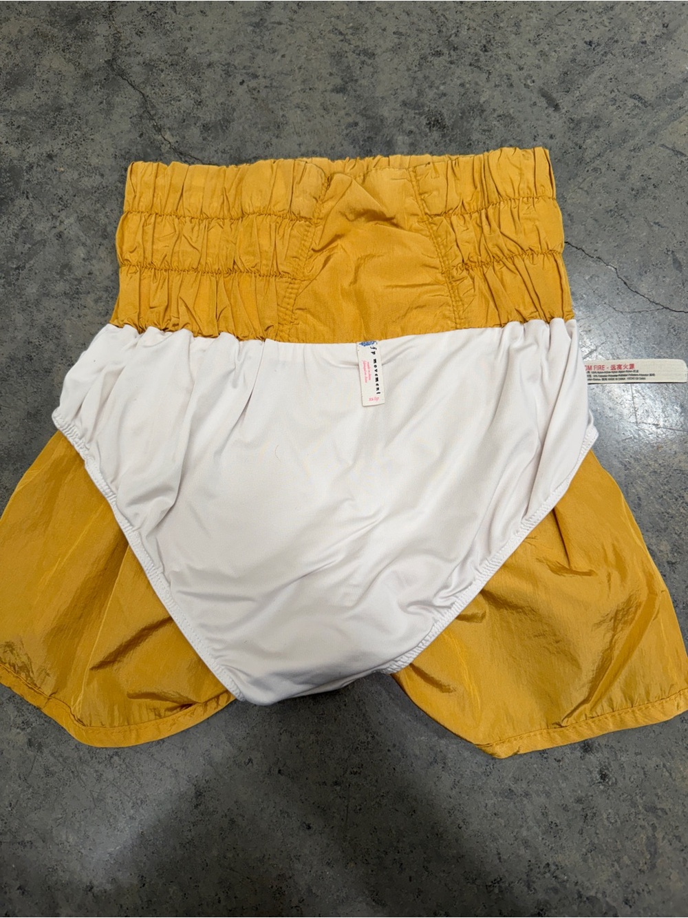 Free People High-Waist Smocked Mustard Yellow Shorts - Picture 4 of 5